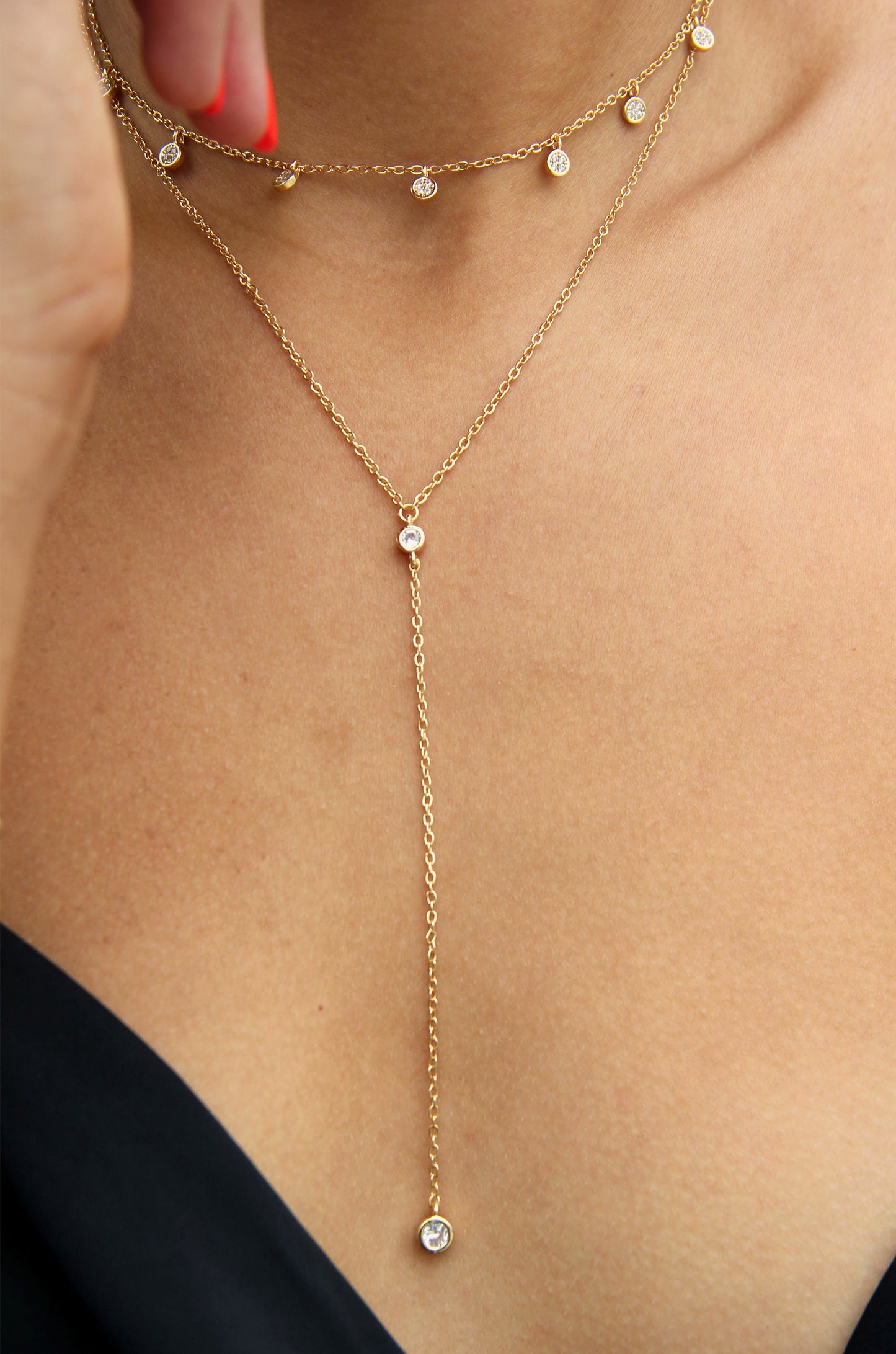 Simplistic Crystal Layered 18k Gold Plated Lariat Necklace Set shown on a model  