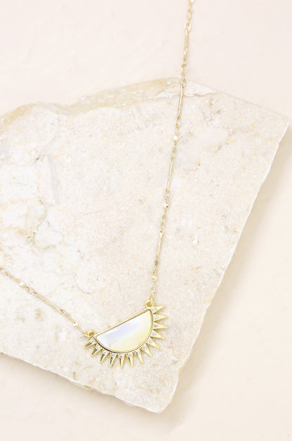Sunset Reflection Mother of Pearl 18k Gold Plated Pendant Necklace on slate background  