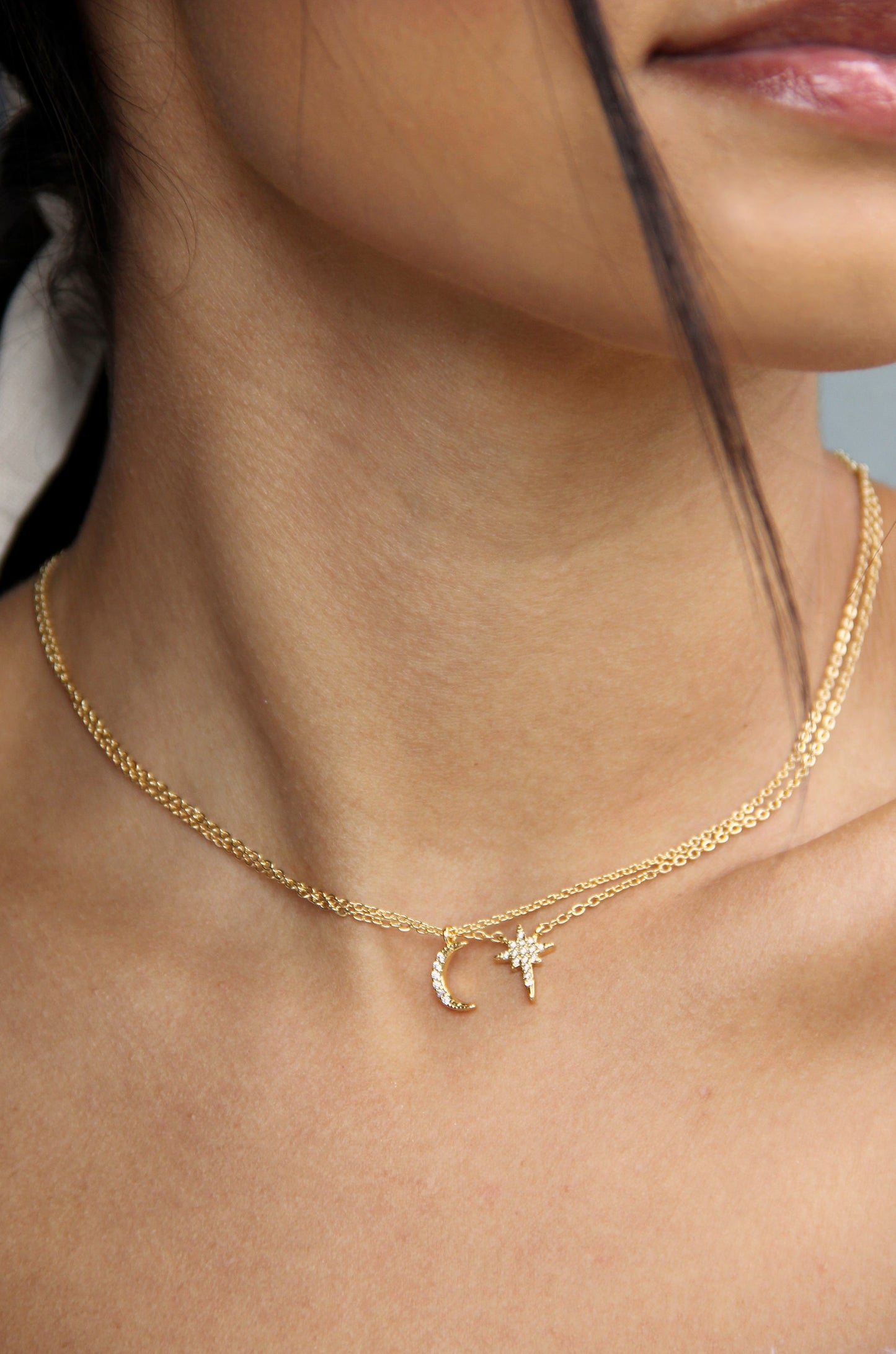 Celestial Crystal 18k Gold Plated Necklace Set shown on a model  