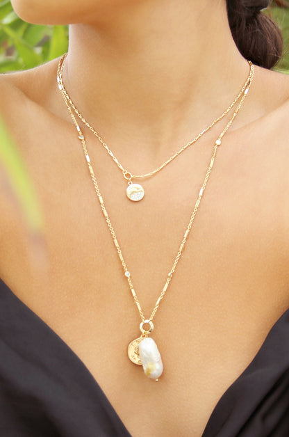 Trusty Trinkets Pearl and Coin 18k Gold Plated Necklace shown on a model  