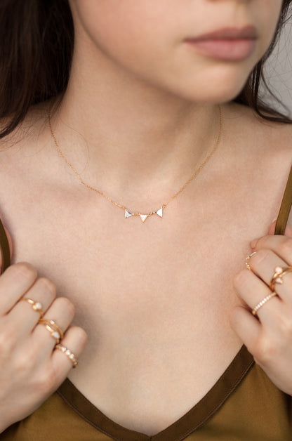 Three Point 18k Gold Plated Crystal Necklace shown on a model  