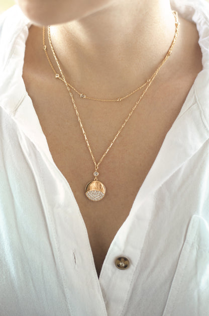 Crystal Dipped Layered Pendant Necklace Set shown on a model  