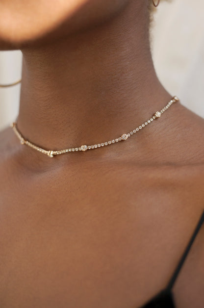 Line Up Crystal Chain and 18k Gold Plated Adjustable Necklace shown on a model  