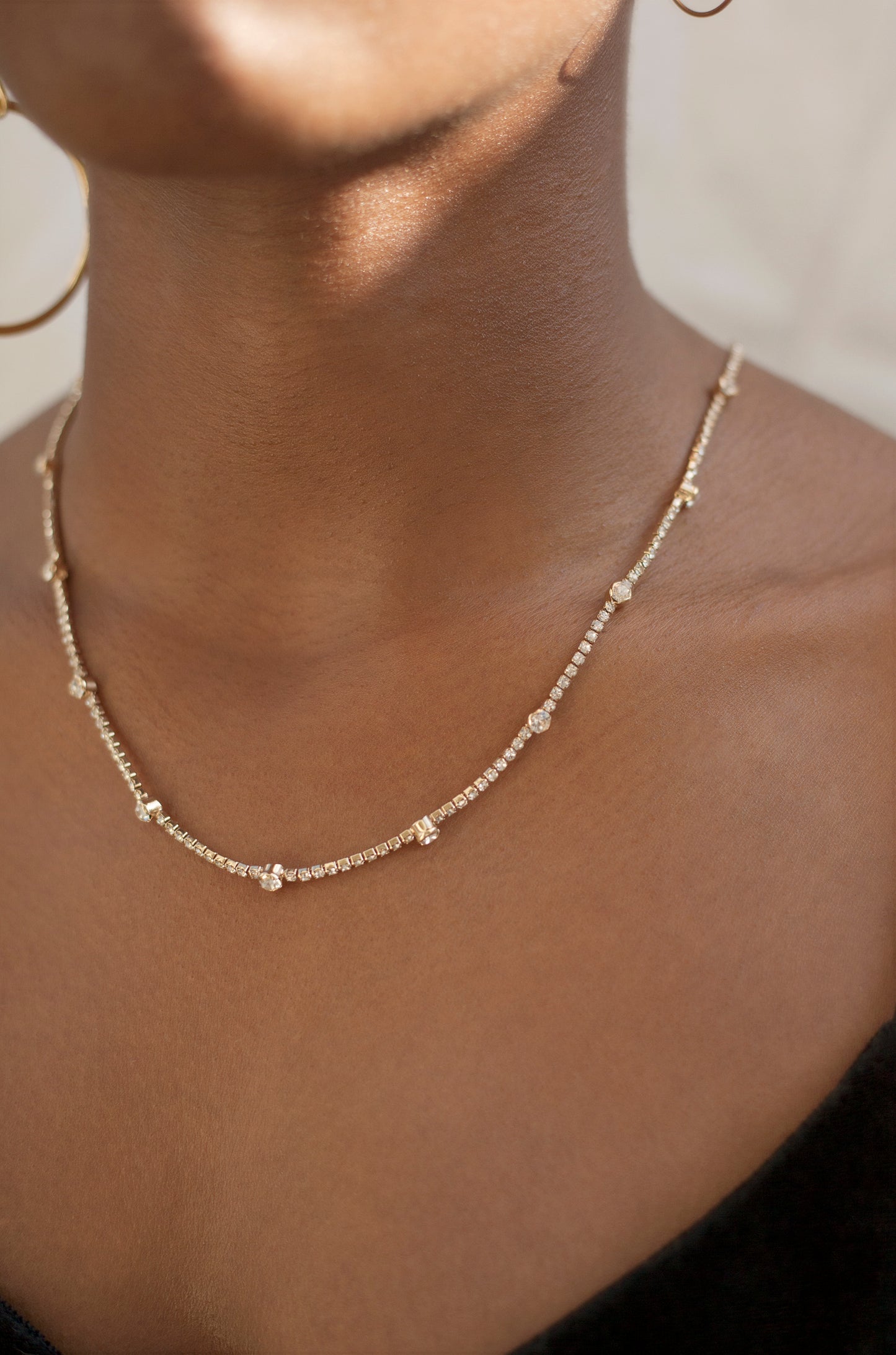 Line Up Crystal Chain and 18k Gold Plated Adjustable Necklace shown on a model  2