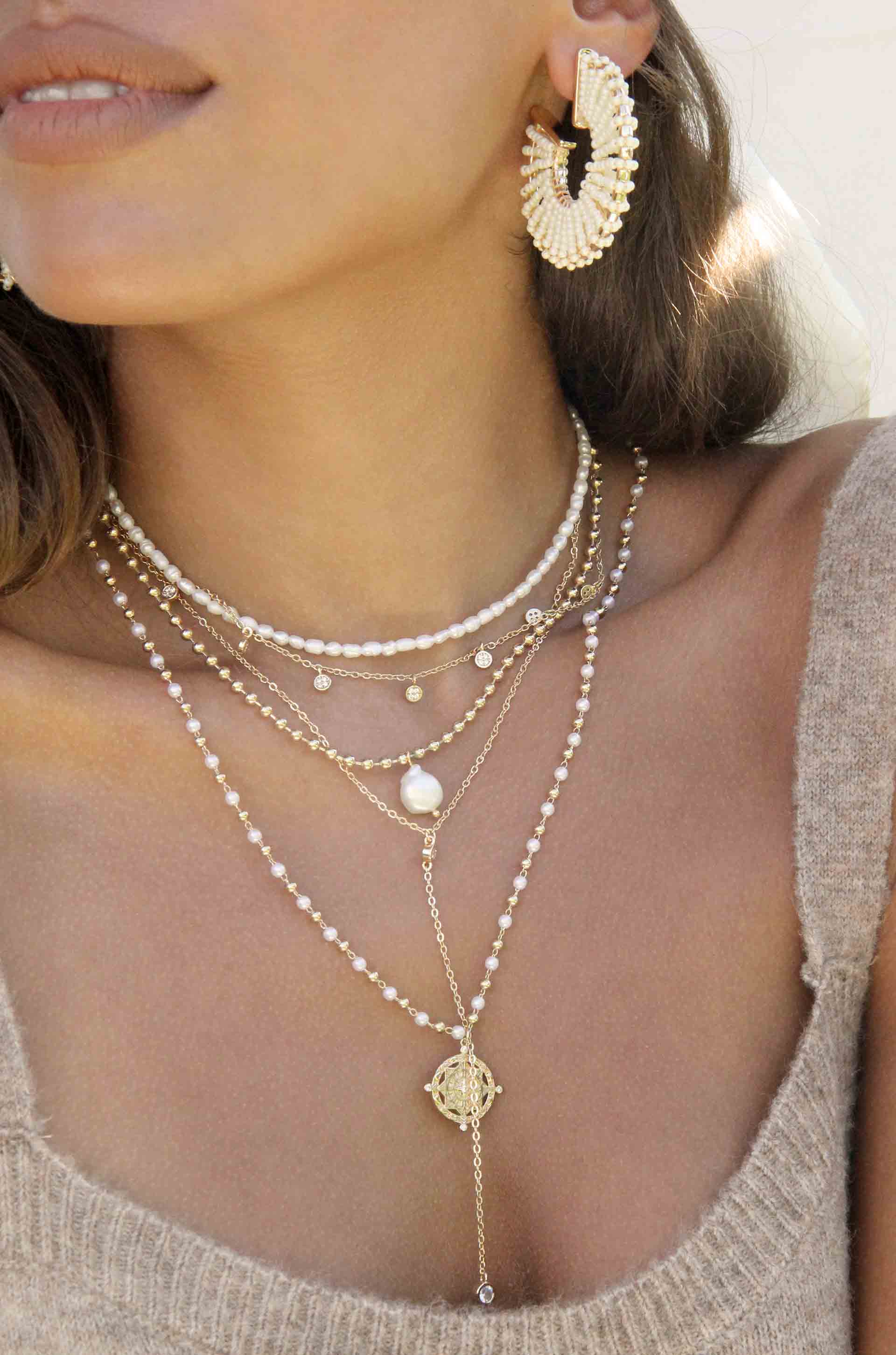 Long Travels Pearl & 18k Gold Plated Ball Chain Necklace shown on a model  