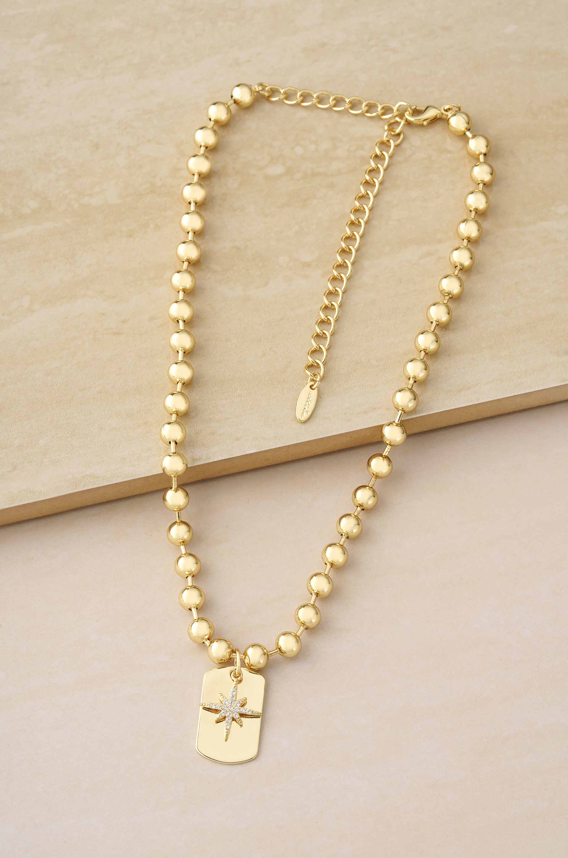 Gold Rush Tag Necklace on slate