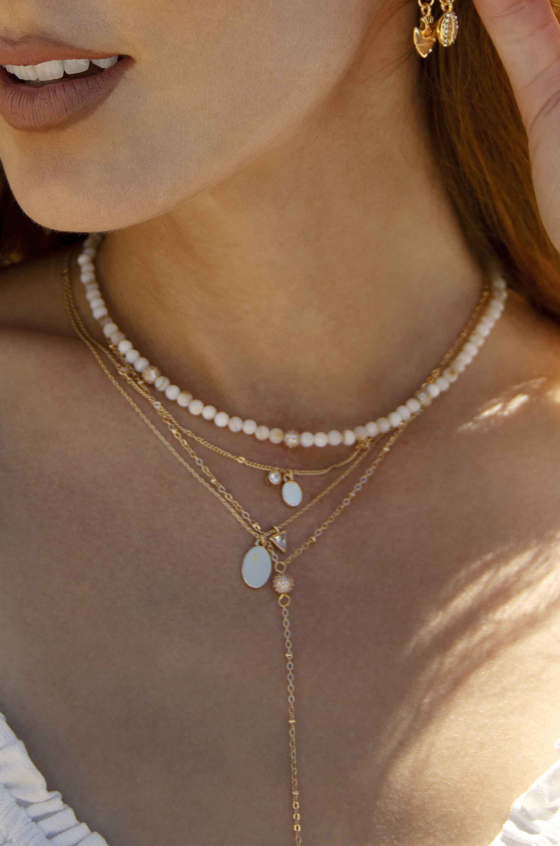 Sophia Dainty Chain 18k Gold Plated Layered Necklace on a model