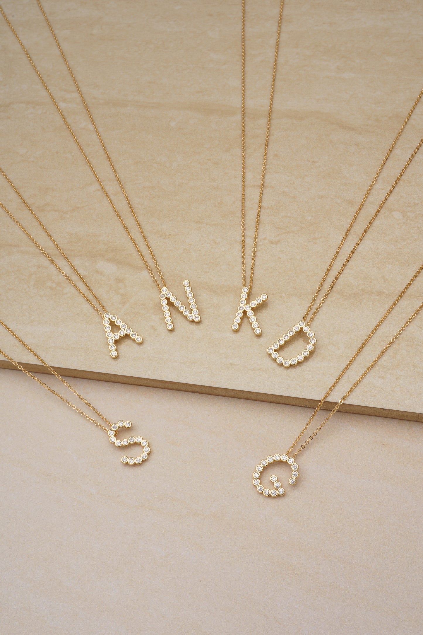Group photo of Simple Crystal Initial 18k Gold Plated Necklaces