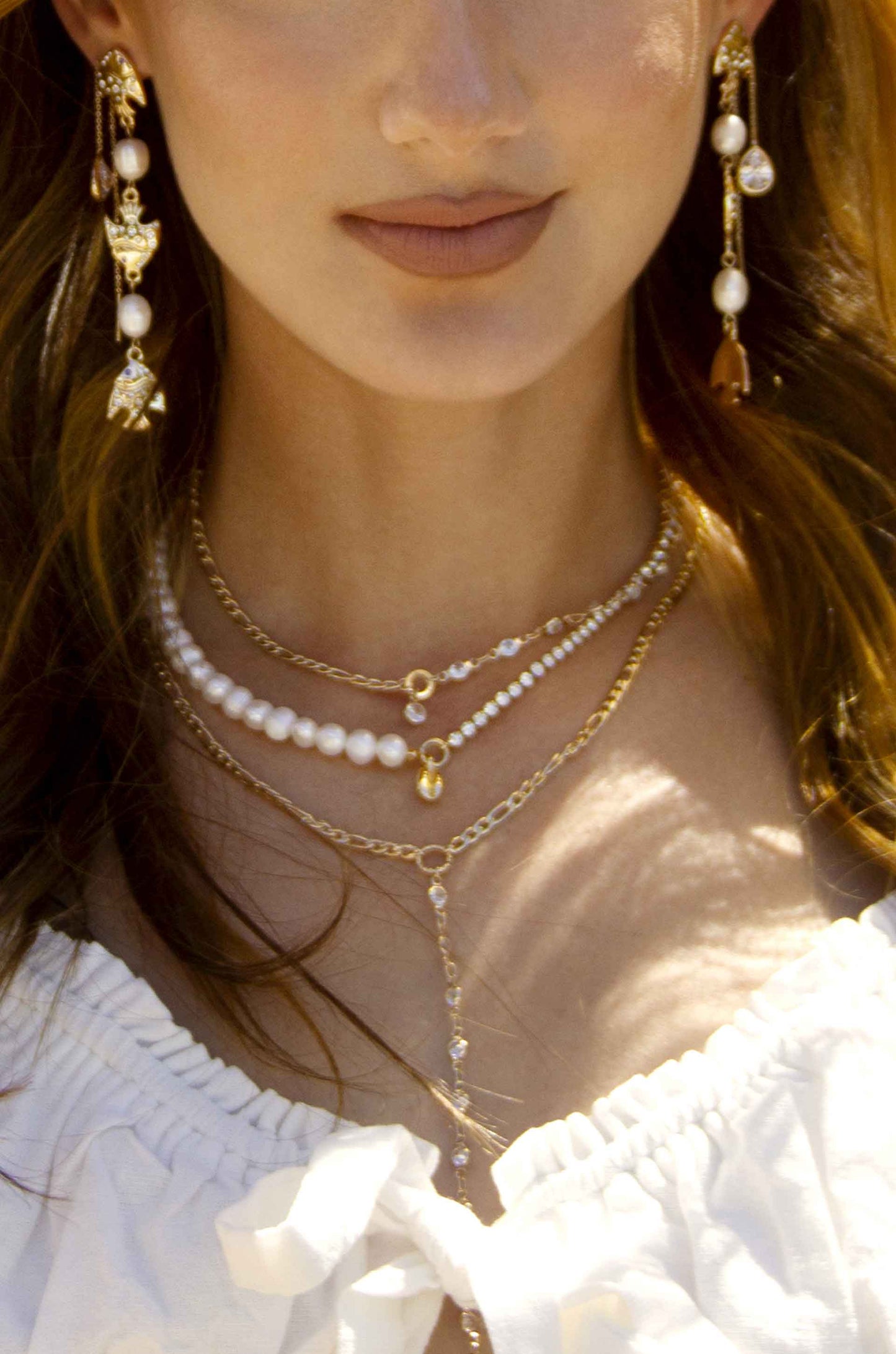 Pearl, Crystal, and Shell 18k Gold Plated Necklace on a model