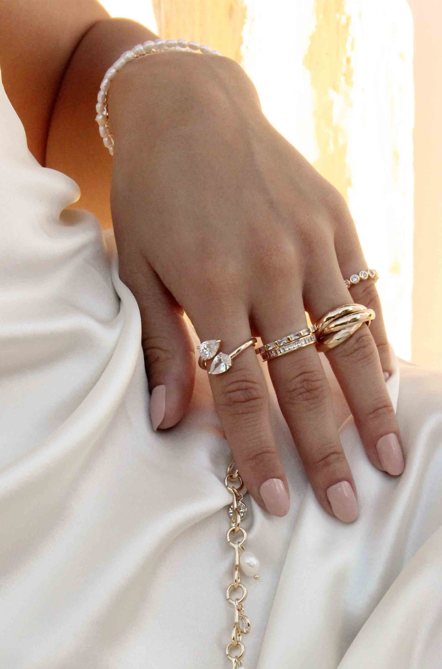 Don't Get It Twisted 18k Gold Plated Gold Ring shown on a model  