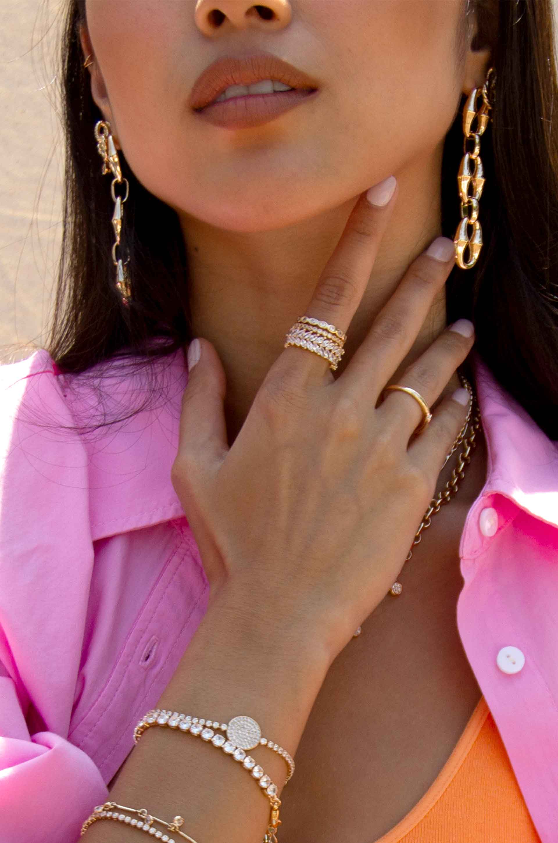 Triple Link Drop 18k Gold Plated Earrings on a model