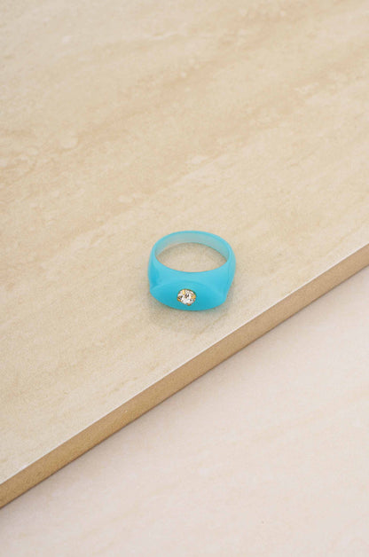 Blue Raspberry Resin Ring with Crystal Accent on slate