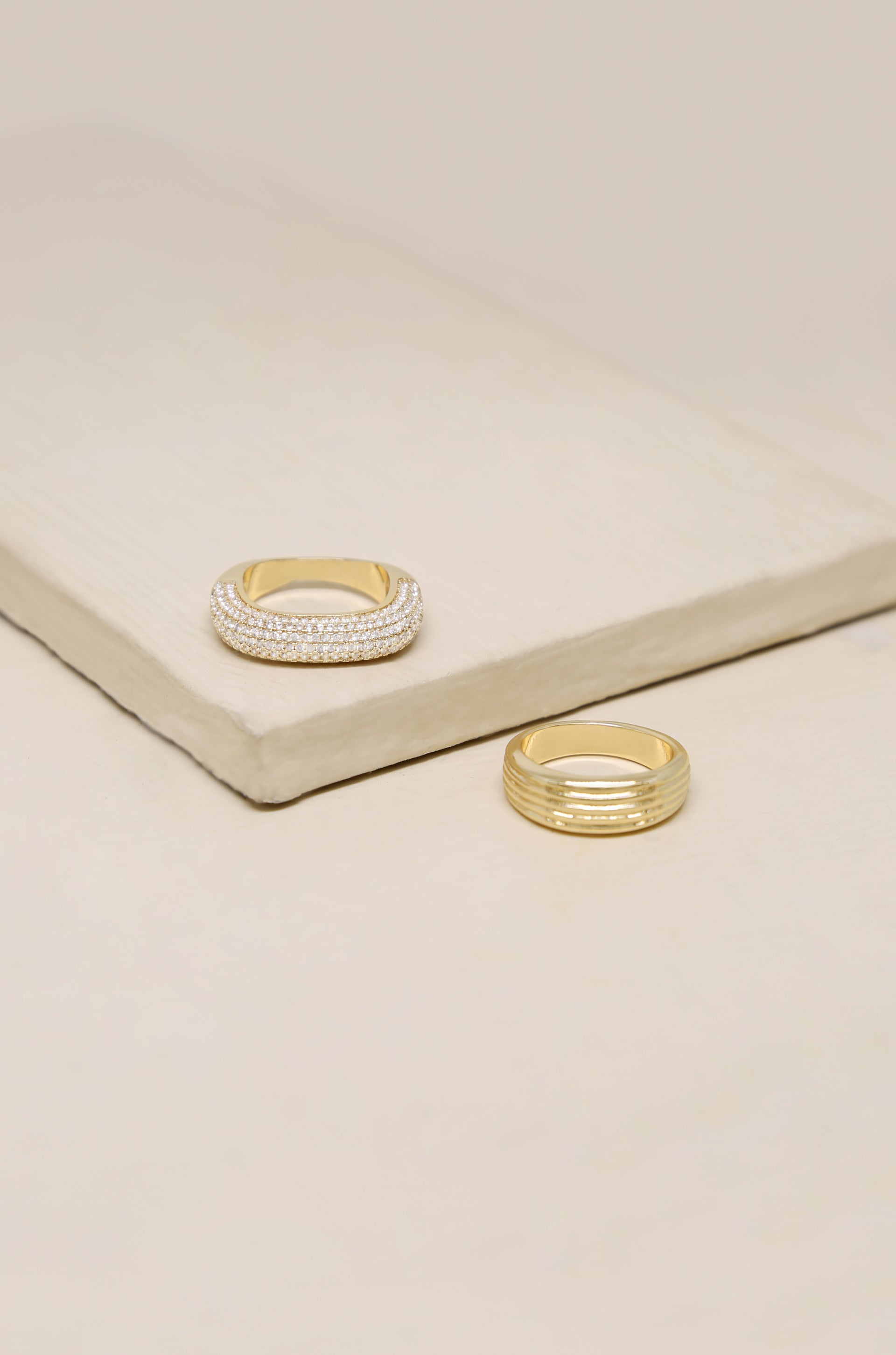 Thick Pave & Textured 18k Gold Plated Ring Band Set on slate background  