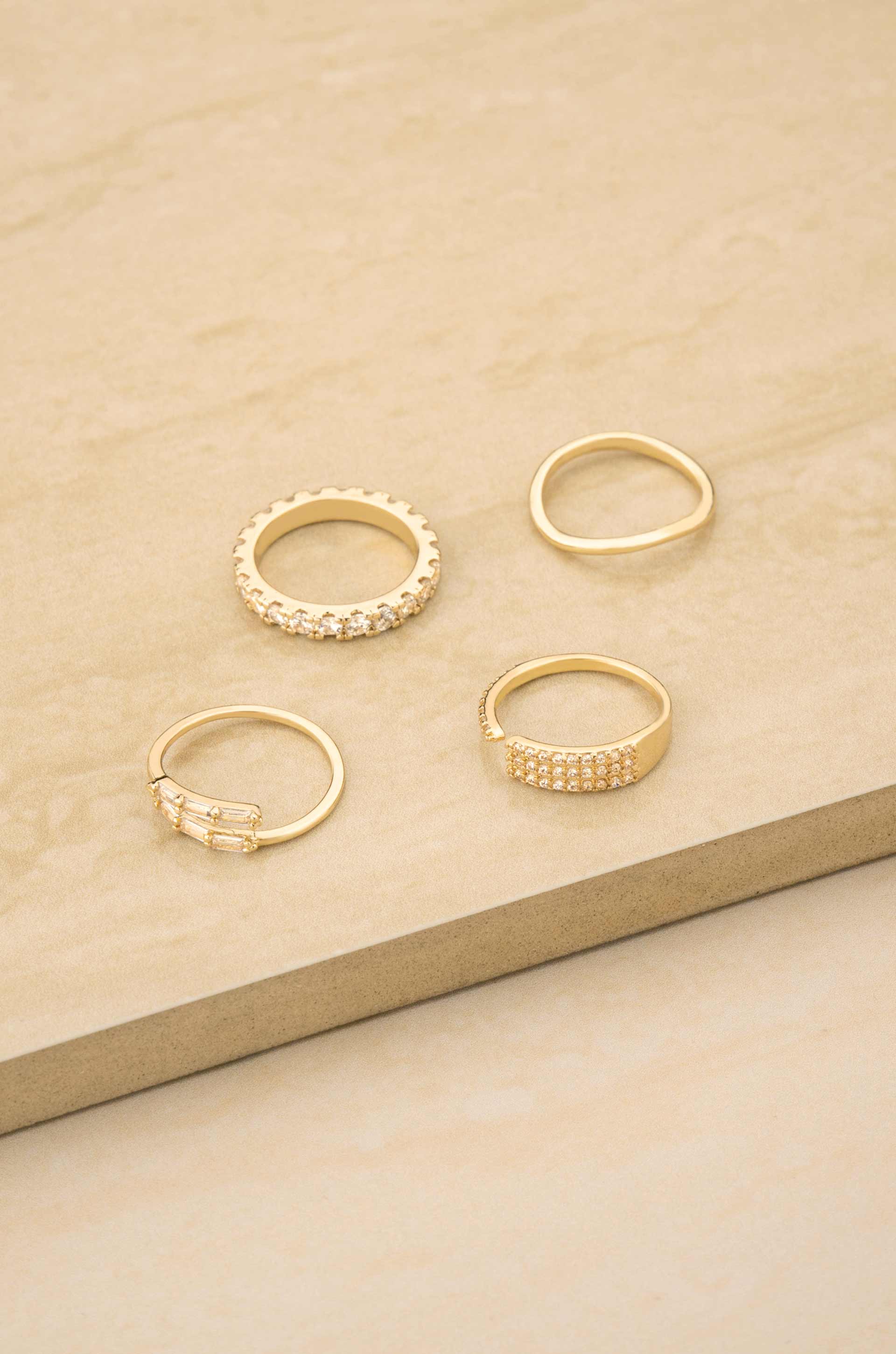 Crystal Lovers 18k Gold Plated Ring Set on slate bakcgound