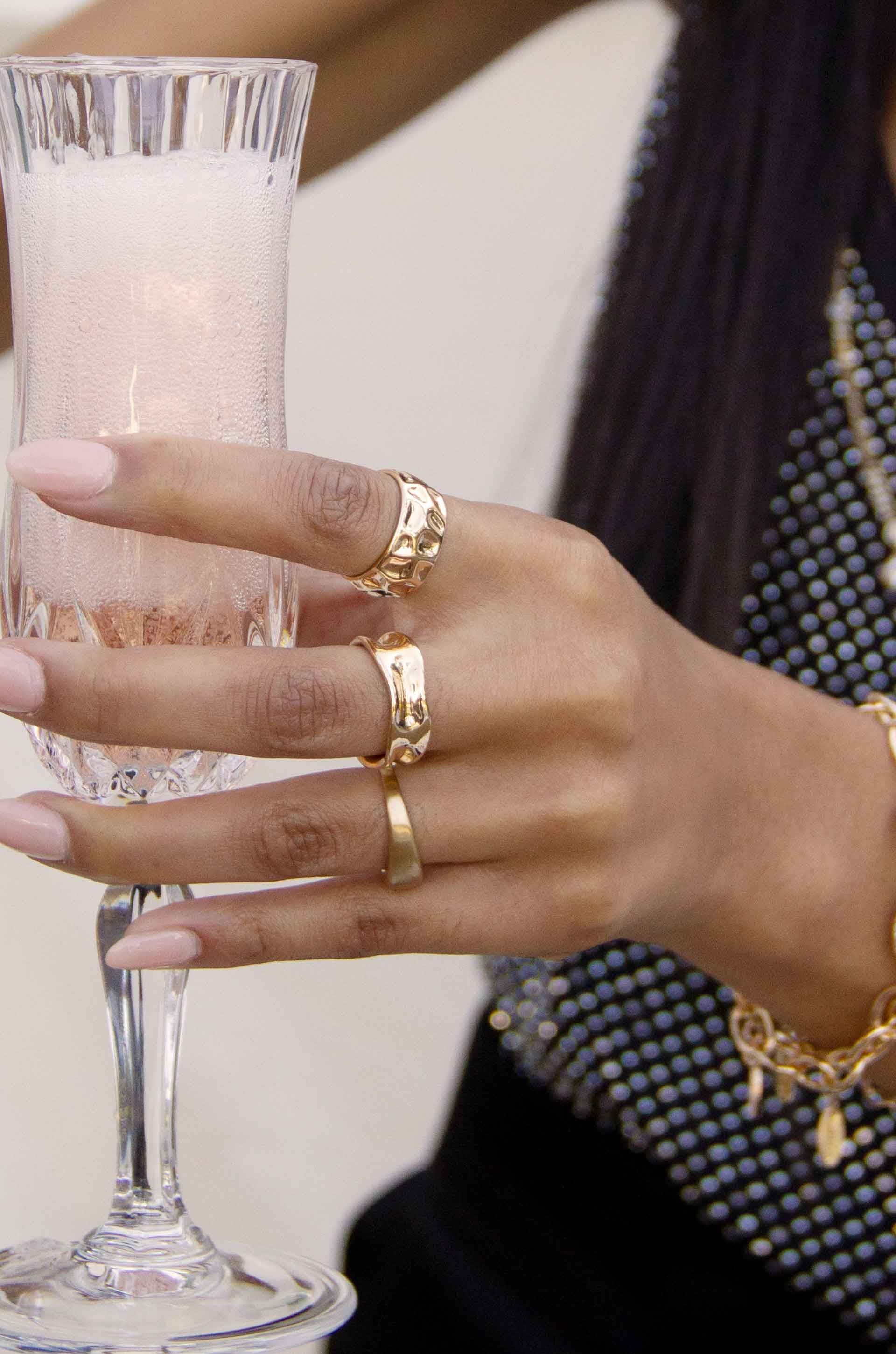 Hammered 18k Gold Plated Ring Set on a model