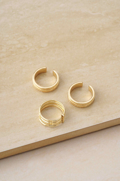 Easy Golden Stackers 18k Gold Plated Ring Set on slate background