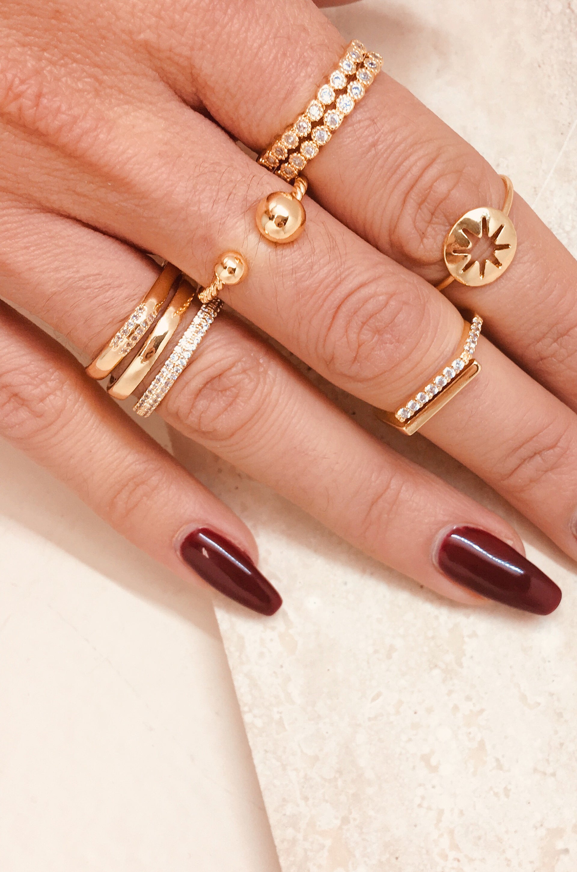 Orbital Crystal 18k Gold Plated Ring Set of 2 shown on a model  